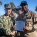 Adm. Brad Cooper, Presents Joint Awards with “R” Device to USS The Sullivans (DDG 68)