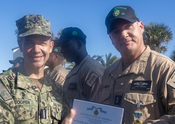Adm. Brad Cooper, Presents Joint Awards with “R” Device to USS The Sullivans (DDG 68)