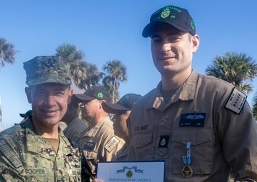 Adm. Brad Cooper, Presents Joint Awards with “R” Device to USS The Sullivans (DDG 68)