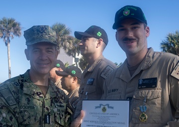 Adm. Brad Cooper, Presents Joint Awards with “R” Device to USS The Sullivans (DDG 68)