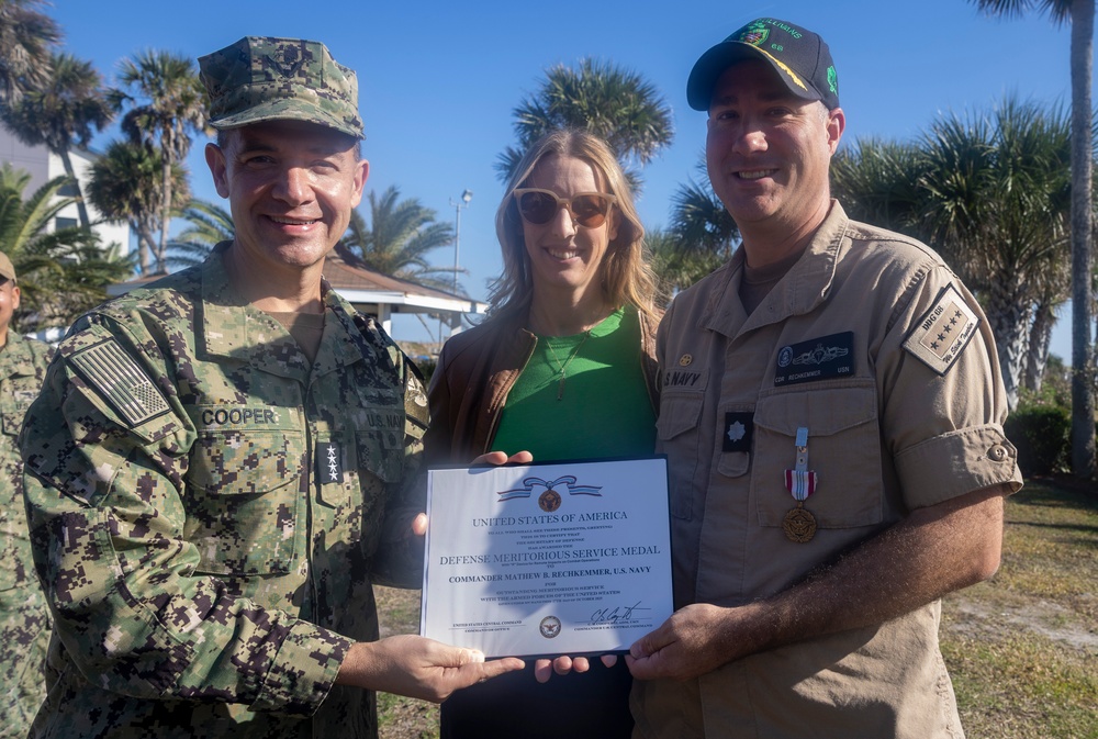 Adm. Brad Cooper, Presents Joint Awards with “R” Device to USS The Sullivans (DDG 68)