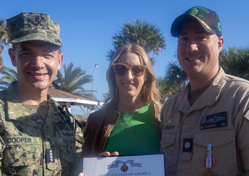 Adm. Brad Cooper, Presents Joint Awards with “R” Device to USS The Sullivans (DDG 68)