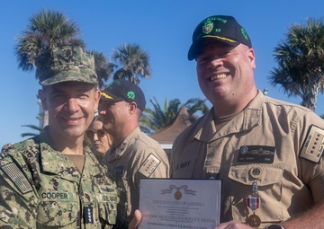Adm. Brad Cooper, Presents Joint Awards with “R” Device to USS The Sullivans (DDG 68)