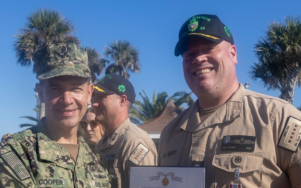Adm. Brad Cooper, Presents Joint Awards with “R” Device to USS The Sullivans (DDG 68)