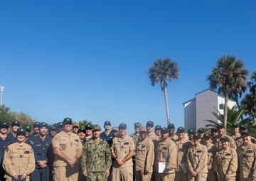 Adm. Brad Cooper, Presents Joint Awards with “R” Device to USS The Sullivans (DDG 68)