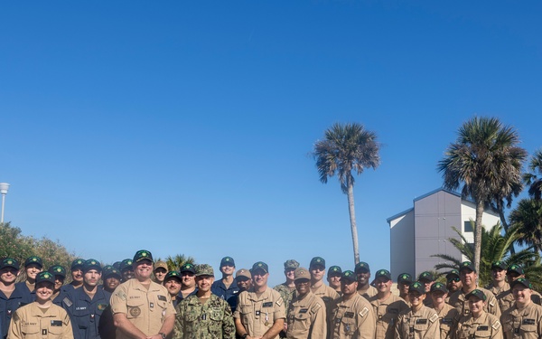 Adm. Brad Cooper, Presents Joint Awards with “R” Device to USS The Sullivans (DDG 68)