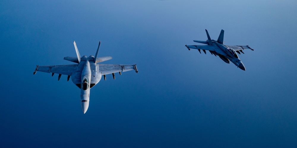 F/A-18 Super Hornets swarm over the Red Sea