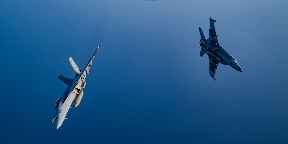 F/A-18 Super Hornets swarm over the Red Sea
