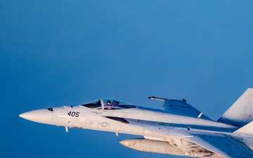 F/A-18 Super Hornets swarm over the Red Sea