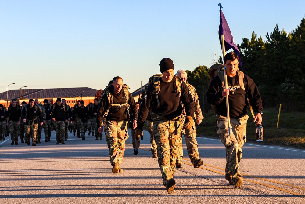 95th Civil Affairs Brigade (Special Operations) (Airborne) Soldiers Carry Their Colors Through a Charity Ruck March