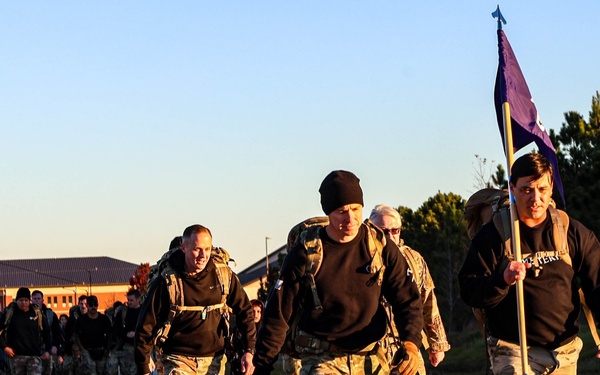 95th Civil Affairs Brigade (Special Operations) (Airborne) Soldiers Carry Their Colors Through a Charity Ruck March