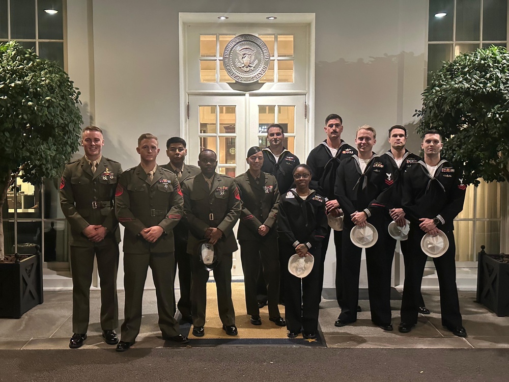 Sailors and Marines Pose for a Photo