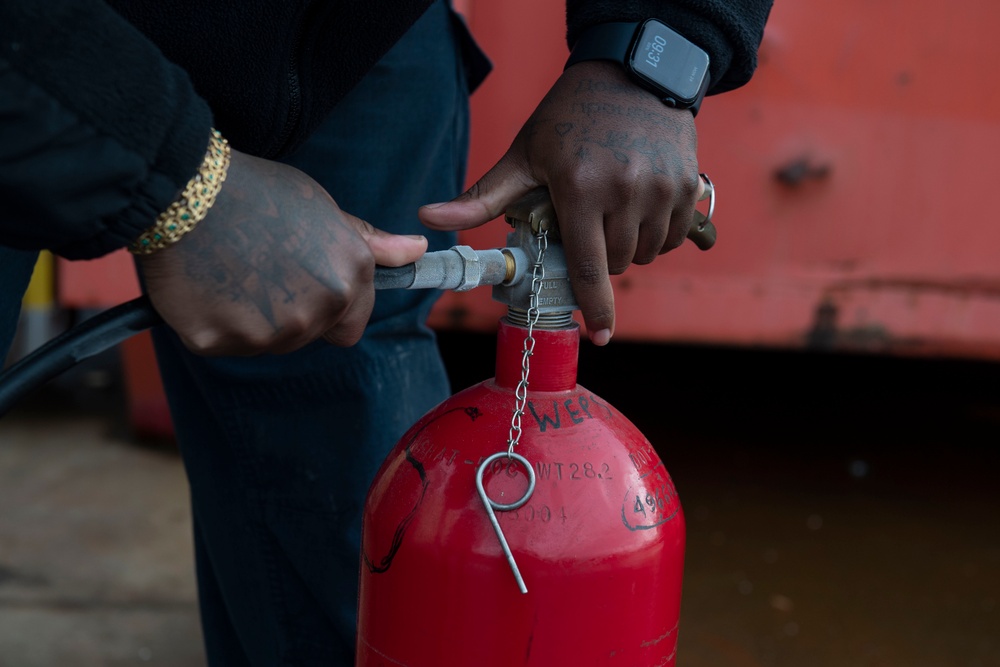 Ronald Reagan Sailors Maintain Firefighting Bottles