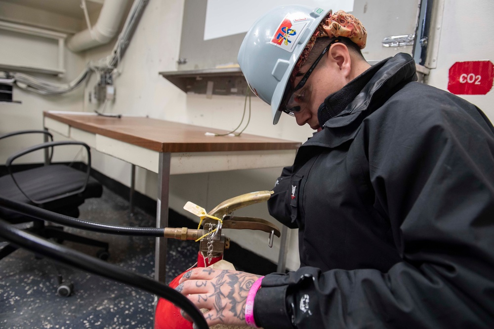 Ronald Reagan Sailors Maintain Firefighting Bottles