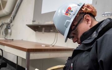 Ronald Reagan Sailors Maintain Firefighting Bottles