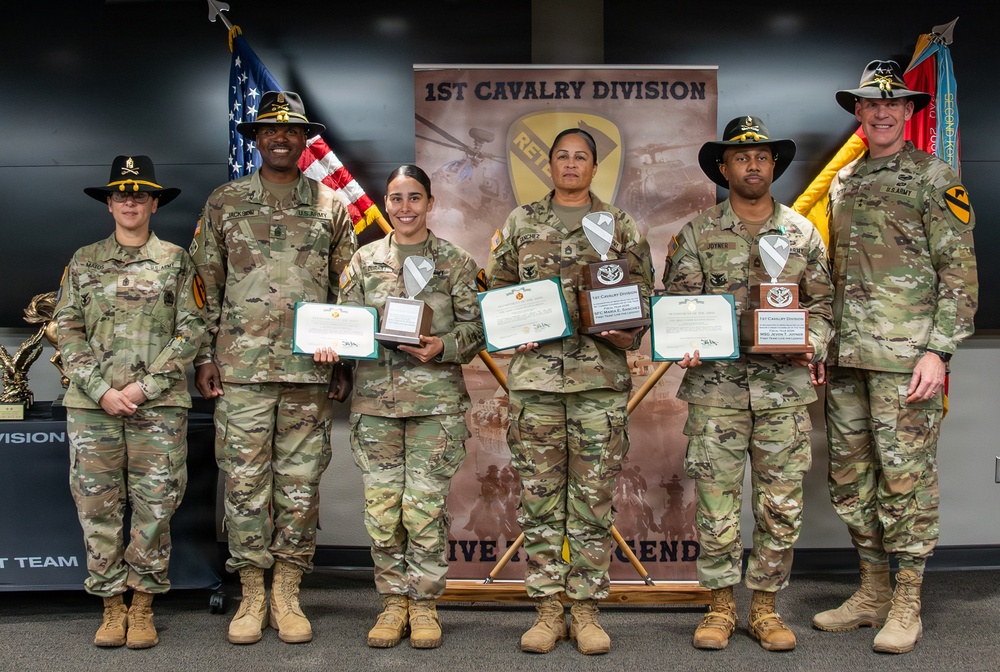 U.S. Army Soldiers receive awards for the 1st Cavalry Division Career Counselor of the Year Competition