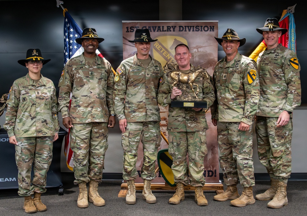 U.S. Army Soldiers receive awards for the 1st Cavalry Division Career Counselor of the Year Competition
