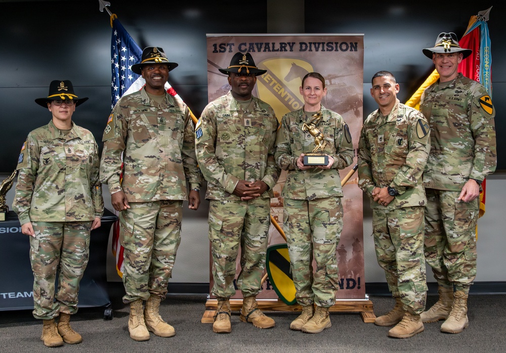 U.S. Army Soldiers receive awards for the 1st Cavalry Division Career Counselor of the Year Competition