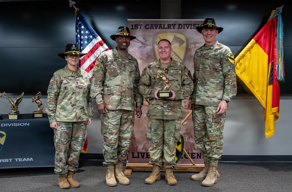 U.S. Army Soldiers receive awards for the 1st Cavalry Division Career Counselor of the Year Competition