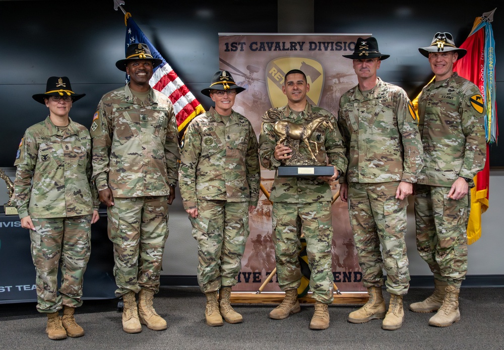 U.S. Army Soldiers receive awards for the 1st Cavalry Division Career Counselor of the Year Competition