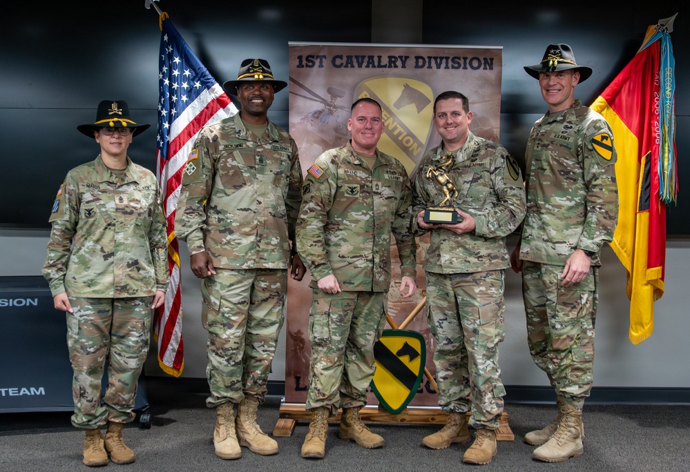 U.S. Army Soldiers receive awards for the 1st Cavalry Division Career Counselor of the Year Competition