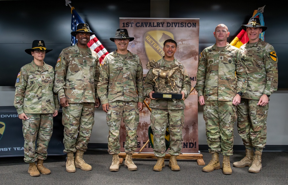 U.S. Army Soldiers receive awards for the 1st Cavalry Division Career Counselor of the Year Competition