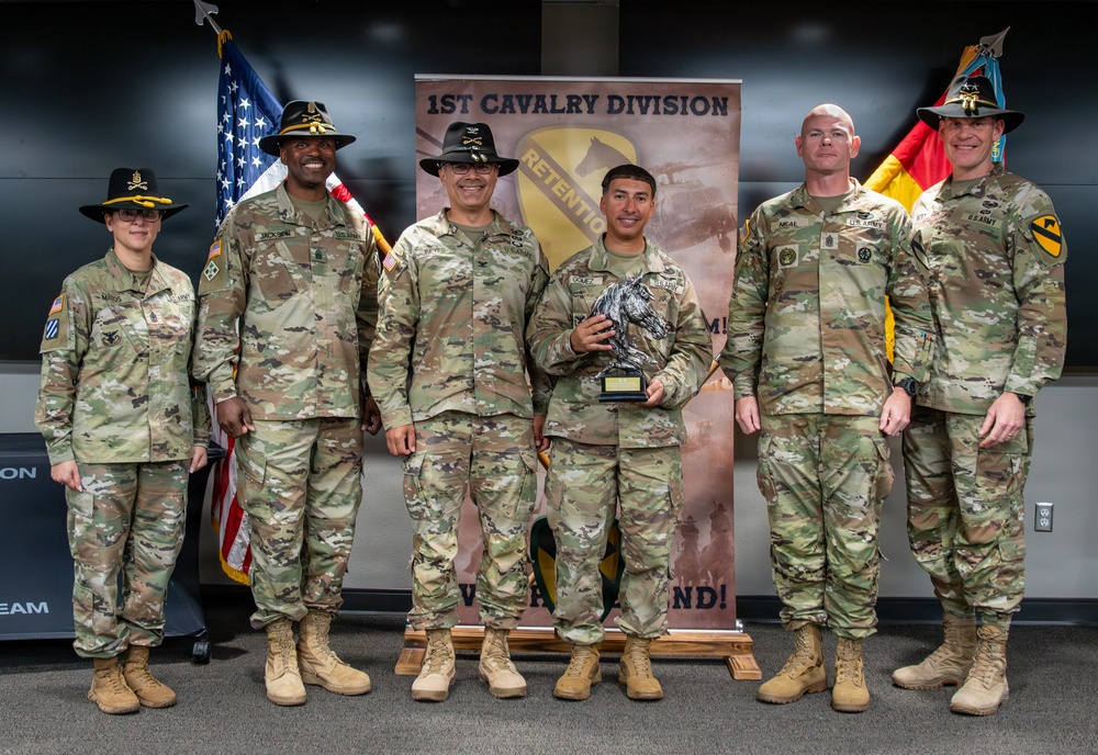 U.S. Army Soldiers receive awards for the 1st Cavalry Division Career Counselor of the Year Competition