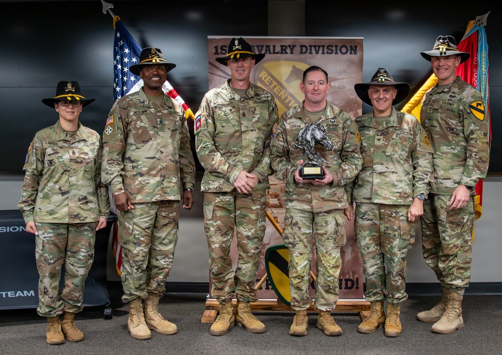 U.S. Army Soldiers receive awards for the 1st Cavalry Division Career Counselor of the Year Competition