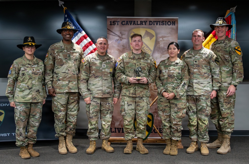U.S. Army Soldiers receive awards for the 1st Cavalry Division Career Counselor of the Year Competition