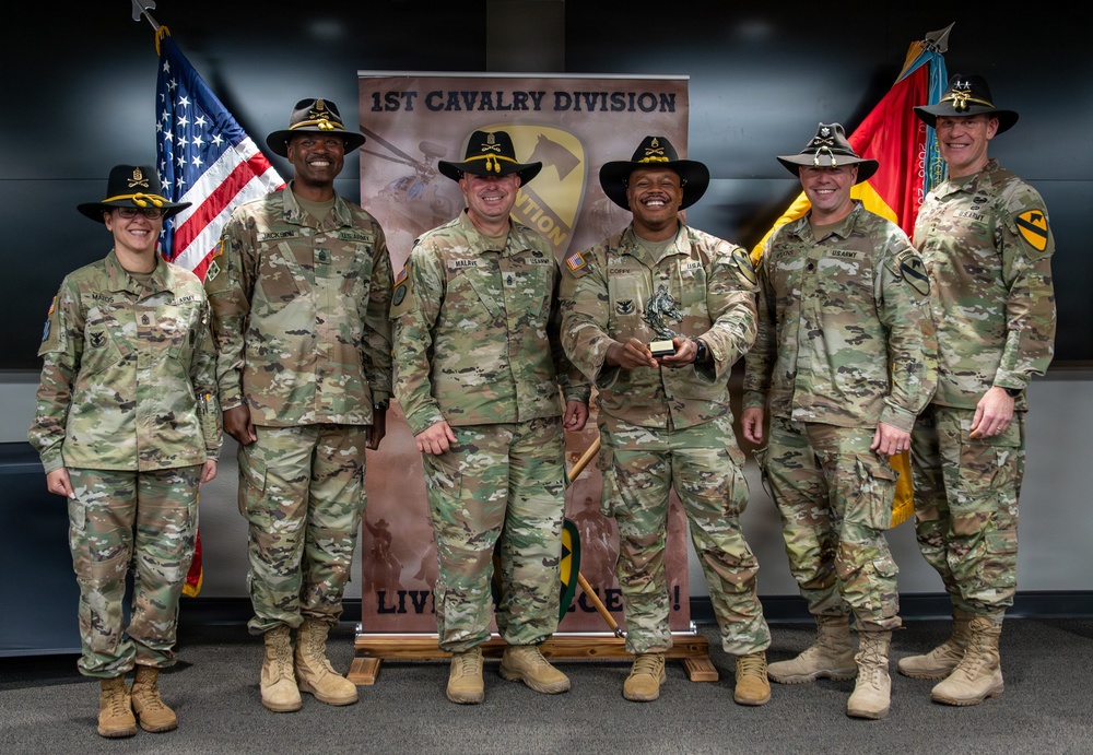 U.S. Army Soldiers receive awards for the 1st Cavalry Division Career Counselor of the Year Competition