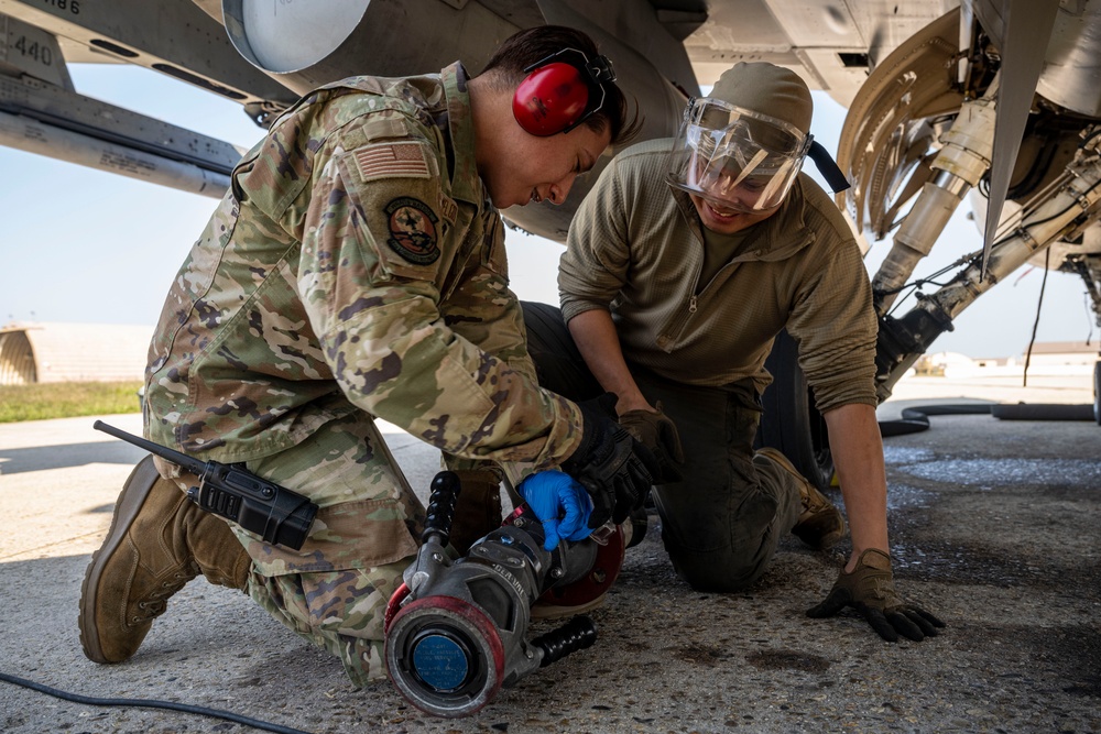 U.S. Airmen conduct refueling and post-flight maintenance at Kunsan AB