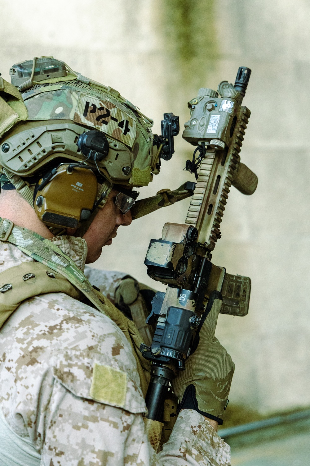 A Reconnaissance Marine with the 24th Marine Expeditionary Unit conducts a rifle drill