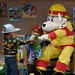 Sparky and friends read at CDC during Fire Prevention Week 2025