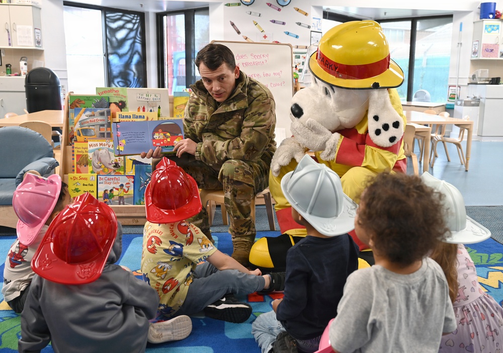 Sparky and friends read at CDC during Fire Prevention Week 2025