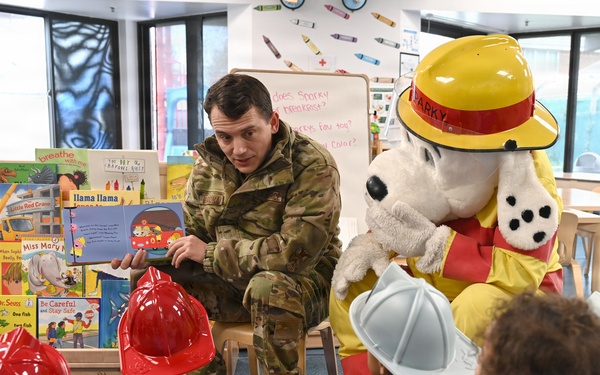 Sparky and friends read at CDC during Fire Prevention Week 2025