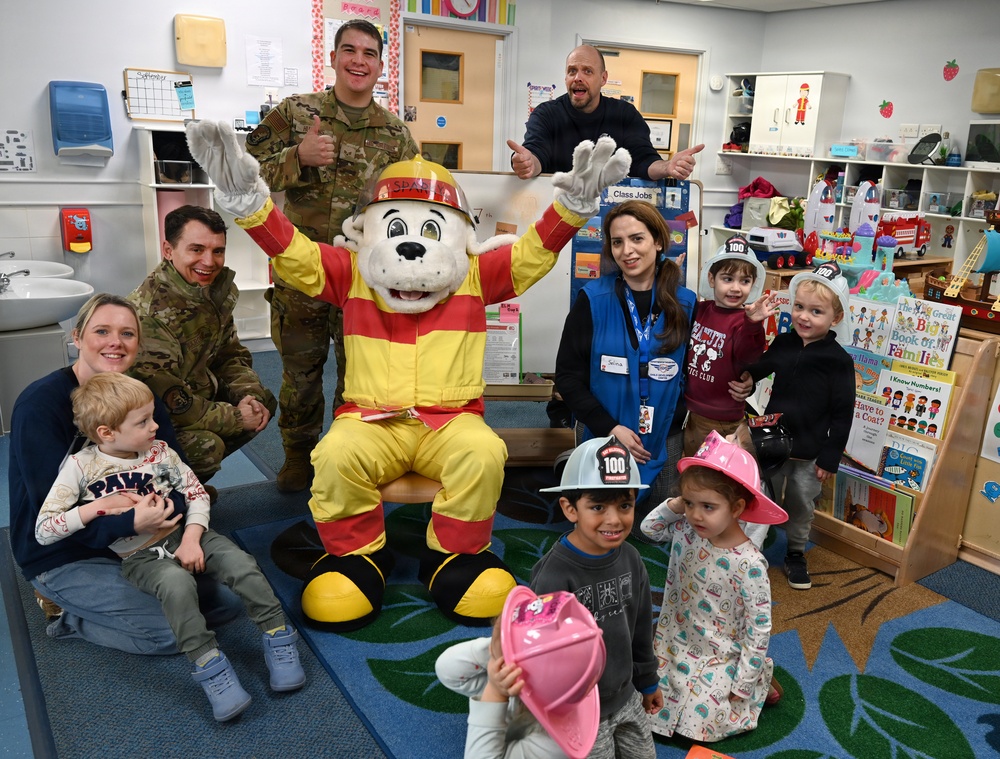 Sparky and friends read at CDC during Fire Prevention Week 2025