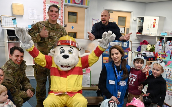 Sparky and friends read at CDC during Fire Prevention Week 2025