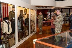 Presentation of Vietnam War-era Army uniform of Al Blencoe for Fort McCoy History Center