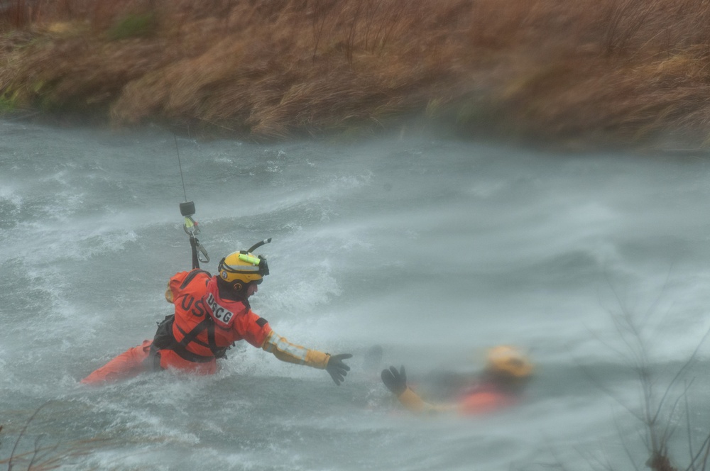 Coast Guard Air Station Traverse City conducts swift water rescue training on Boardman River