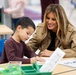 First Lady Melania Trump Helps Student Create Cardstock Turkey at DoDEA Americas DeLalio Elementary School