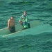 Coast Guard rescues 4 people from capsized boat off Clearwater