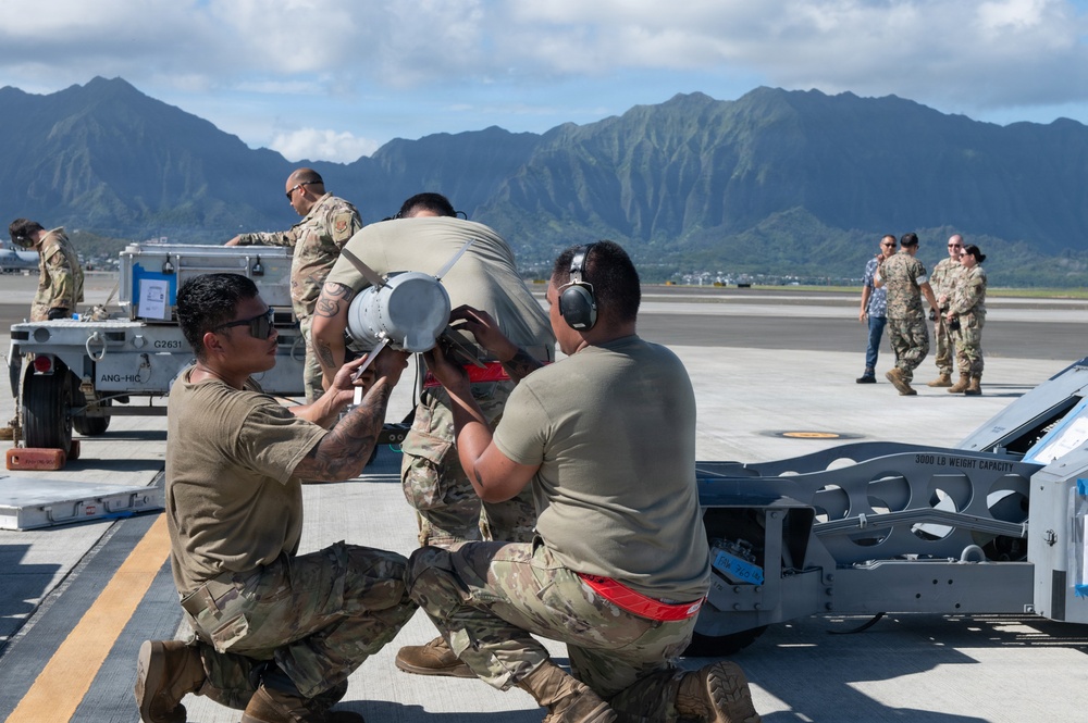 Total Force Airmen Execute Integrated Combat Turn for F-22 Raptors