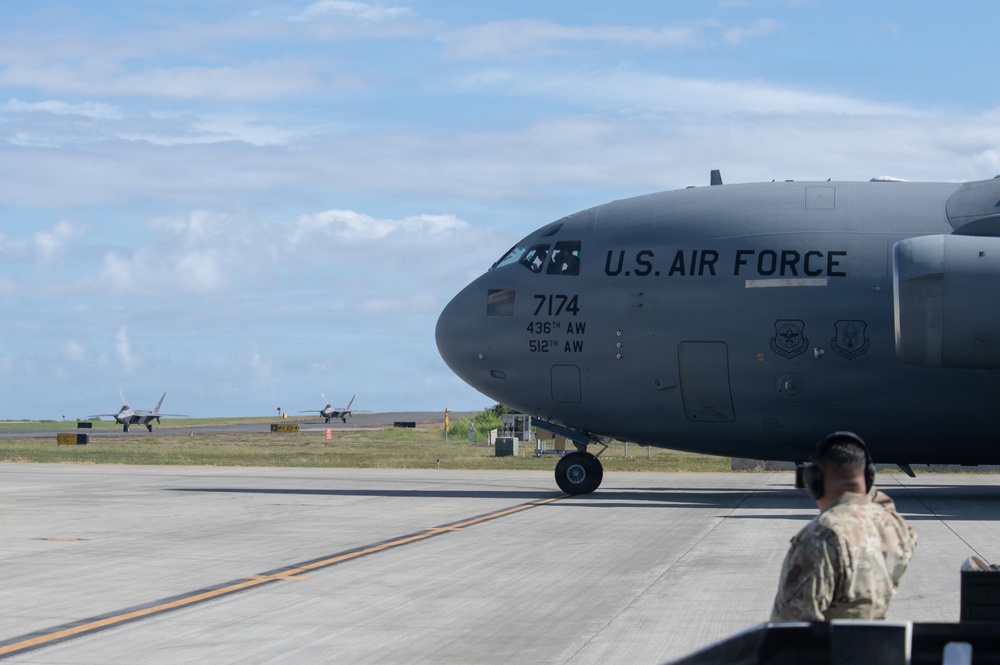 Total Force Airmen Execute Integrated Combat Turn for F-22 Raptors