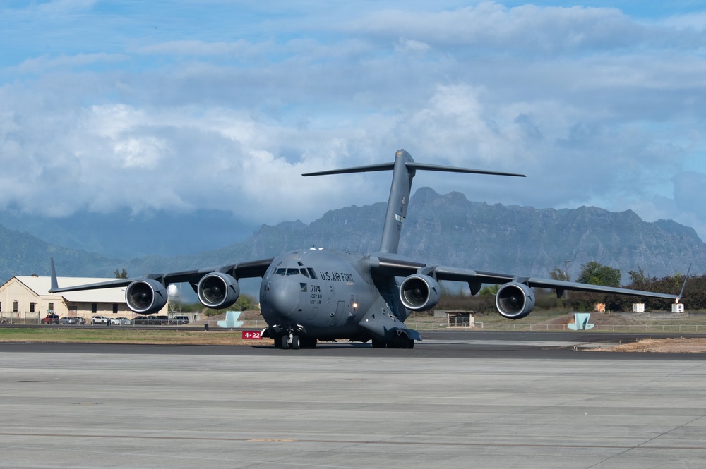 Total Force Airmen Execute Integrated Combat Turn for F-22 Raptors