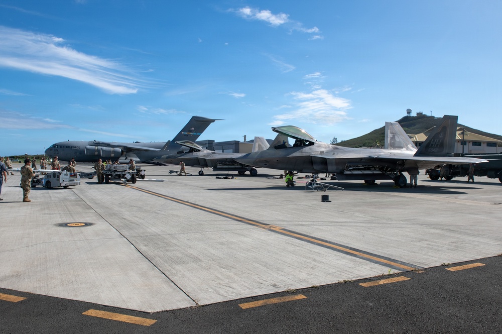 Total Force Airmen Execute Integrated Combat Turn for F-22 Raptors