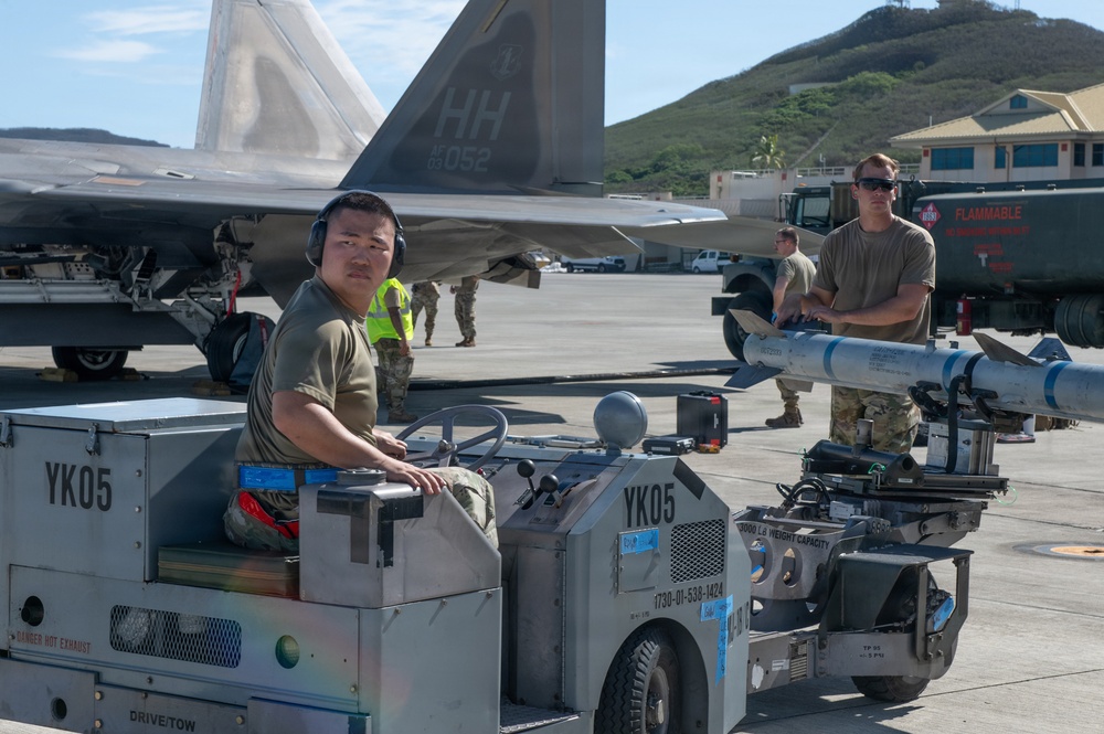 Total Force Airmen Execute Integrated Combat Turn for F-22 Raptors