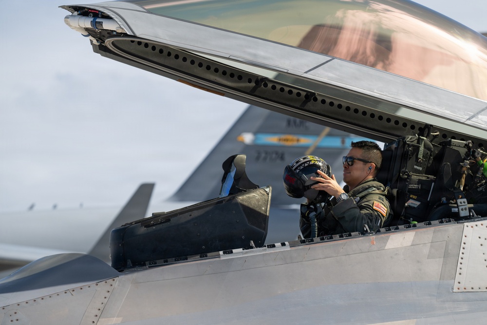 Total Force Airmen Execute Integrated Combat Turn for F-22 Raptors
