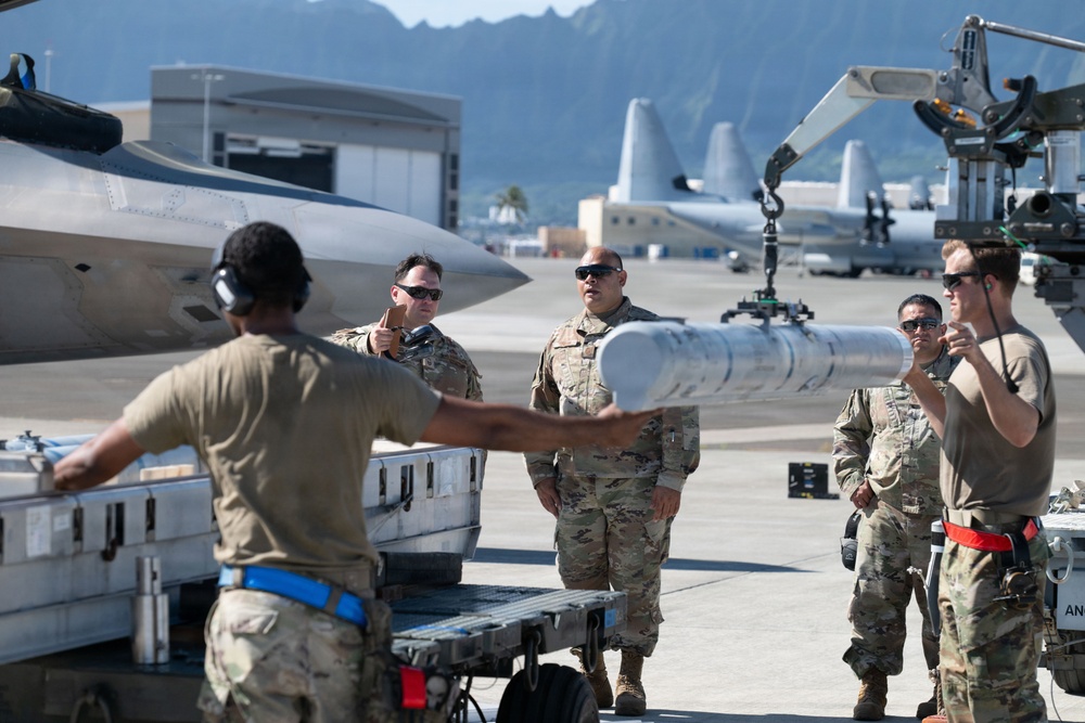 Total Force Airmen Execute Integrated Combat Turn for F-22 Raptors