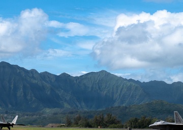 Total Force Airmen Execute Integrated Combat Turn for F-22 Raptors