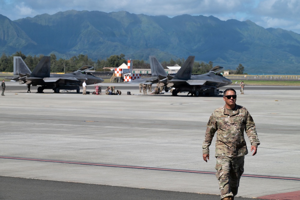 Total Force Airmen Execute Integrated Combat Turn for F-22 Raptors